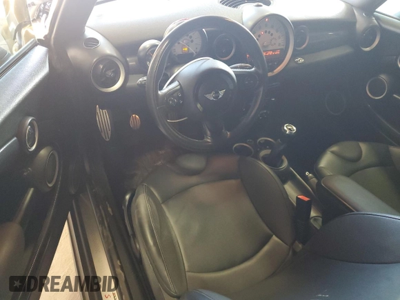 2012 MINI Convertible S с VIN WMWZP3C51CT296318, выставлен на аукционе Copart как лот 47701405 с пробегом 78 842 миль миль и Списание • Salvage title. История ставок и продаж доступна на DreamBid. Изображение 8.