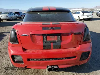 2015 MINI Coupe S z VIN WMWSX3C59FT409468, wystawiony jako Copart lot #71401384 z przebiegiem Nie podano mil oraz Szkody całkowita. Historia ofert i sprzedaży dostępna na DreamBid. Obrazek 6.