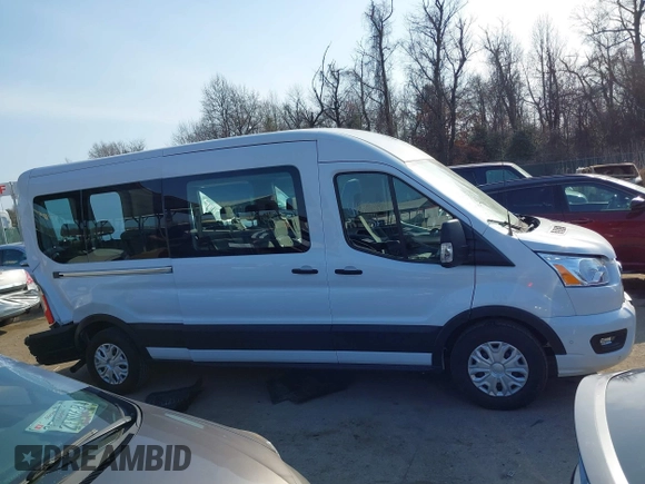 2021 Ford Transit Passenger XL with VIN 1FBAX2C89MKA49631, listed as a IAAI auction lot 41773770 with 77,260 mi miles and . Bid and sale history available at DreamBid. Image 13.