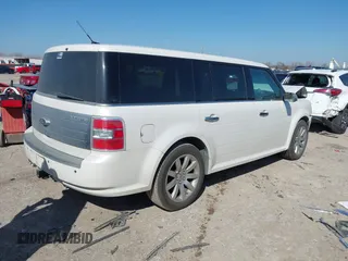 2011 Ford Flex Limited with VIN 2FMGK5DC9BBD00918, listed as a IAAI auction lot 41630521 with 141,914 mi miles. Bid and sale history available at carsss.com. Image 4.