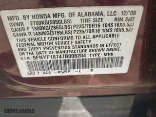 2007 Honda Pilot EX-L with VIN 5FNYF18747B008204, listed as a IAAI auction lot 41668603 with 223,213 mi miles. Bid and sale history available at carsss.com. Image 9.