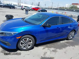 2017 Honda Civic LX z VIN 2HGFC2F56HH516730, wystawiony jako IAAI lot #42130963 z przebiegiem 119 236 mil mil oraz . Historia ofert i sprzedaży dostępna na DreamBid. Obrazek 14.