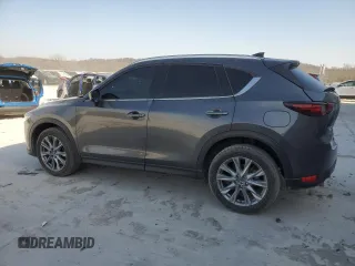 2021 Mazda CX-5 Grand Touring with VIN JM3KFBDM0M1464817, listed as a Copart auction lot 48821965 with 53,648 mi miles and Clean Title. Bid and sale history available at carsss.com. Image 2.