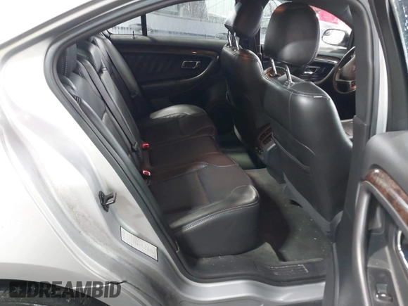2014 Ford Taurus Limited with VIN 1FAHP2F81EG101351, listed as a IAAI auction lot 41662308 with 139,542 mi miles. Bid and sale history available at carsss.com. Image 8.