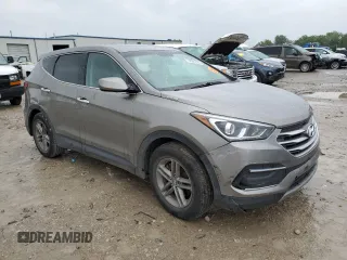 2018 Hyundai Santa Fe 2.4L z VIN 5NMZTDLB0JH087449, wystawiony jako Copart lot #58903105 z przebiegiem 114 037 mil mil oraz Szkoda całkowita • Salvage title. Historia ofert i sprzedaży dostępna na DreamBid. Obrazek 4.