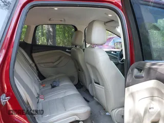 2014 Ford Escape Titanium with VIN 1FMCU9JX7EUB68165, listed as a IAAI auction lot 42141235 with 172,041 mi miles and . Bid and sale history available at DreamBid. Image 8.