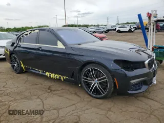 2018 BMW 7 Series 750i xDrive z VIN WBA7B0C52JG527205, wystawiony jako Copart lot #57452265 z przebiegiem 120 655 mil mil oraz Czysty tytuł • Clean title. Historia ofert i sprzedaży dostępna na DreamBid. Obrazek 4.