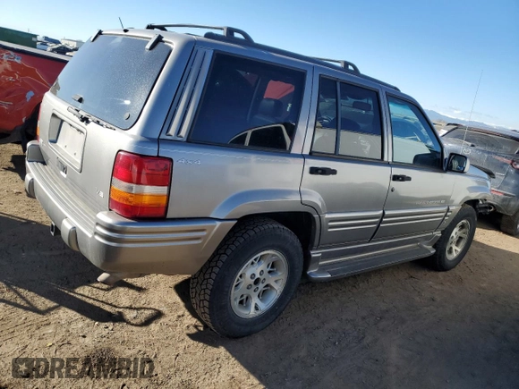 1997 Jeep Grand Cherokee Limited with VIN 1J4GZ78Y4VC568288, listed as a Copart auction lot 88265025 with 185,015 mi miles and Salvage Title. Bid and sale history available at carsss.com. Image 3.