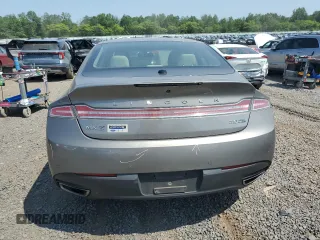 2016 Lincoln MKZ z VIN 3LN6L2J99GR620863, wystawiony jako Copart lot #59547725 z przebiegiem 121 607 mil mil oraz Szkoda całkowita • Salvage title. Historia ofert i sprzedaży dostępna na DreamBid. Obrazek 6.