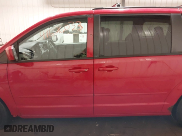2013 Dodge Grand Caravan SXT with VIN 2C4RDGCG9DR669053, listed as a IAAI auction lot 41626033 with 170,007 mi miles and . Bid and sale history available at DreamBid. Image 15.
