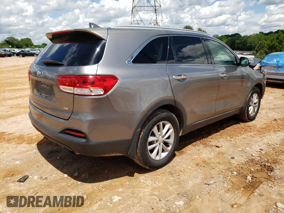 2017 Kia Sorento LX z VIN 5XYPG4A35HG297508, wystawiony jako Copart lot #56898275 z przebiegiem 137 498 mil mil oraz Szkoda całkowita • Salvage title. Historia ofert i sprzedaży dostępna na DreamBid. Obrazek 3.