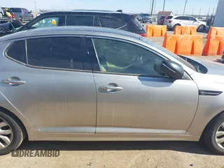 2014 Kia Optima EX z VIN 5XXGN4A74EG260054, wystawiony jako IAAI lot #41464688 z przebiegiem 40 498 mil mil oraz . Historia ofert i sprzedaży dostępna na DreamBid. Obrazek 13.