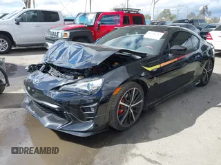 2019 Toyota 86 GT with VIN JF1ZNAE10K9702100, listed as a IAAI auction lot 41786513 with 56,687 mi miles. Bid and sale history available at carsss.com. Image 2.