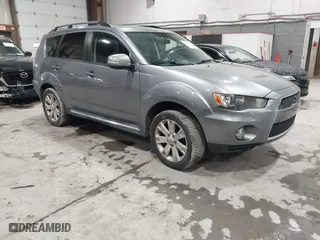 2013 Mitsubishi Outlander SE with VIN JA4AS3AW0DU009292, listed as a IAAI auction lot 41497517 with 167,812 mi miles. Bid and sale history available at carsss.com. Image 1.