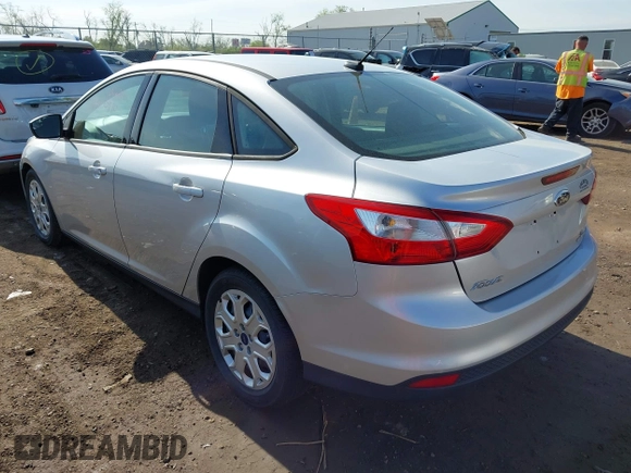 2012 Ford Focus SE with VIN 1FAHP3F20CL372391, listed as a IAAI auction lot 42100970 with 126,112 mi miles and . Bid and sale history available at DreamBid. Image 3.
