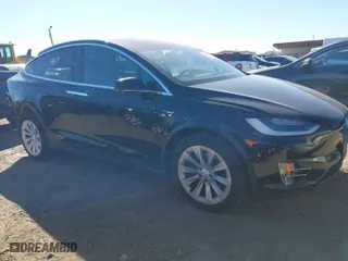 2019 Tesla Model X 75D with VIN 5YJXCDE2XKF161371, listed as a IAAI auction lot 41174741 with 34,979 mi miles. Bid and sale history available at carsss.com. Image 1.