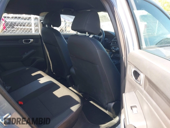 2023 Honda Civic Sport with VIN 2HGFE2F55PH517831, listed as a IAAI auction lot 42255985 with 31,554 mi miles and . Bid and sale history available at DreamBid. Image 8.