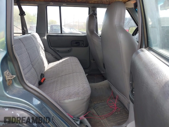 1998 Jeep Cherokee Sport with VIN 1J4FJ68S0WL269553, listed as a IAAI auction lot 42207389 with 261,377 mi miles and . Bid and sale history available at DreamBid. Image 8.
