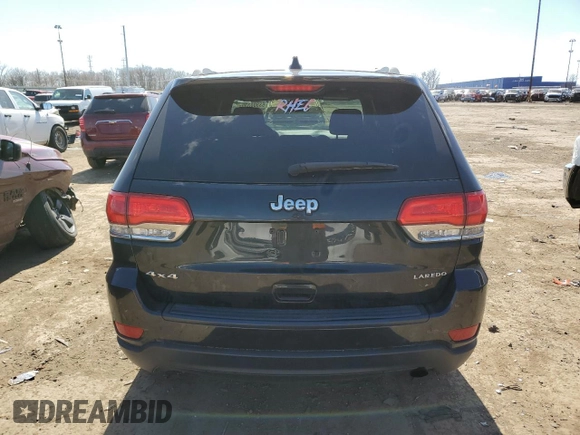 2014 Jeep Grand Cherokee Laredo with VIN 1C4RJFAG0EC242229, listed as a Copart auction lot 53300335 with 191,209 mi miles and Salvage Title. Bid and sale history available at DreamBid. Image 6.