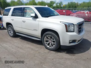 2015 GMC Yukon SLT z VIN 1GKS2BKC9FR500463, wystawiony jako IAAI lot #42193102 z przebiegiem 155 323 mil mil oraz . Historia ofert i sprzedaży dostępna na DreamBid. Obrazek 1.