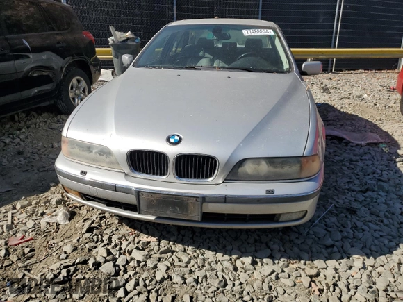 2000 BMW 5 Series 528iA with VIN WBADM6344YGU10582, listed as a Copart auction lot 77468634 with 0 mi miles and Salvage Title. Bid and sale history available at carsss.com. Image 5.