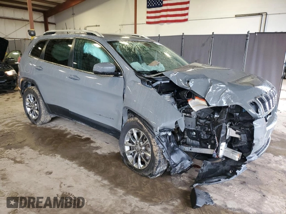 2019 Jeep Cherokee Latitude Plus with VIN 1C4PJMLX3KD469249, listed as a Copart auction lot 51704975 with 56,937 mi miles and Salvage Title. Bid and sale history available at carsss.com. Image 4.