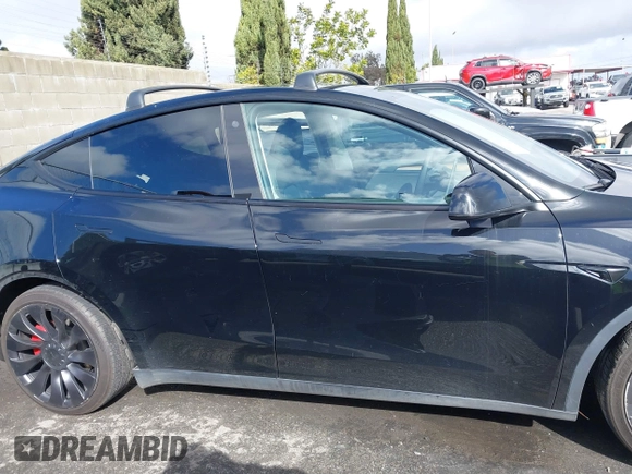 2022 Tesla Model Y Performance z VIN 7SAYGDEF9NF532880, wystawiony jako IAAI lot #41583671 z przebiegiem 38 057 mil mil oraz . Historia ofert i sprzedaży dostępna na DreamBid. Obrazek 14.