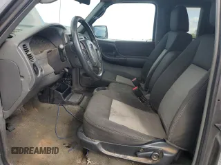 2010 Ford Ranger XL with VIN 1FTKR1EE9APA75197, listed as a Copart auction lot 51602795 with 173,363 mi miles and Salvage title. Bid and sale history available at DreamBid. Image 7.