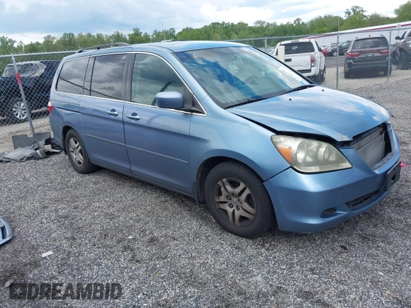 2007 Honda Odyssey EX z VIN 5FNRL38467B087065, wystawiony jako IAAI lot #42204370 z przebiegiem 242 844 mil mil oraz . Historia ofert i sprzedaży dostępna na DreamBid. Obrazek 1.