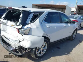2021 Chevrolet Equinox LT with VIN 3GNAXKEV1ML351581, listed as a IAAI auction lot 41764202 with 71,547 mi miles and . Bid and sale history available at DreamBid. Image 4.