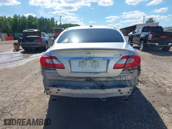 2013 Infiniti M with VIN JN1BY1AP0DM513527, listed as a IAAI auction lot 42170513 with 194,908 mi miles and . Bid and sale history available at DreamBid. Image 6.