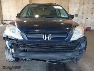 2009 Honda CR-V LX with VIN 5J6RE483X9L061781, listed as a IAAI auction lot 41893907 with 211,511 mi miles. Bid and sale history available at carsss.com. Image 13.
