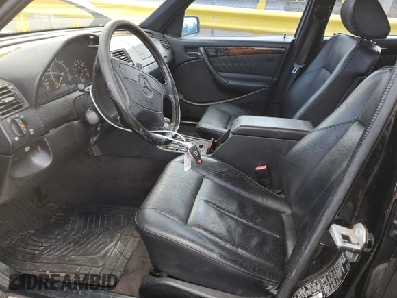 1998 Mercedes-Benz C 230/260/280/320 with VIN WDBHA23G2WA555649, listed as a Copart auction lot 46755375 with 179,263 mi miles and Salvage title. Bid and sale history available at DreamBid. Image 7.
