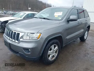 2012 Jeep Grand Cherokee Laredo with VIN 1C4RJFAGXCC118823, listed as a IAAI auction lot 41808398 with 153,509 mi miles. Bid and sale history available at carsss.com. Image 17.