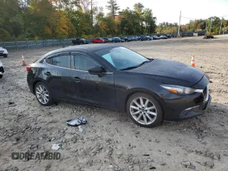 2017 Mazda 3 Grand Touring with VIN JM1BN1W39H1141169, listed as a Copart auction lot 74678054 with 158,067 mi miles and Salvage Title. Bid and sale history available at DreamBid. Image 4.