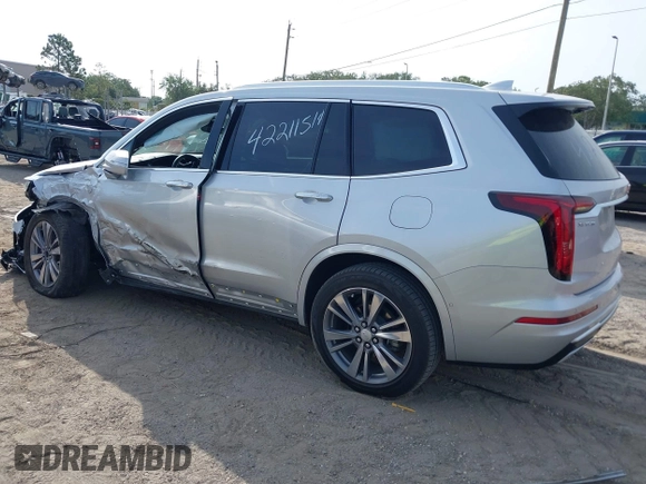 2020 Cadillac XT6 FWD Premium Luxury z VIN 1GYKPCRSXLZ136057, wystawiony jako IAAI lot #42211514 z przebiegiem 32 476 mil mil oraz . Historia ofert i sprzedaży dostępna na DreamBid. Obrazek 3.