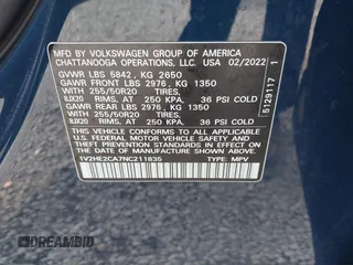 2022 Volkswagen Atlas SE z VIN 1V2HE2CA7NC211835, wystawiony jako IAAI lot #42722660 z przebiegiem 56 112 mil mil oraz . Historia ofert i sprzedaży dostępna na DreamBid. Obrazek 9.