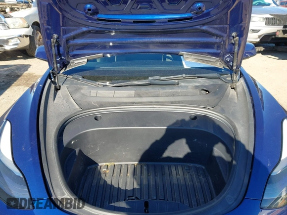 2022 Tesla Model 3 Long Range with VIN 5YJ3E1EB1NF257059, listed as a IAAI auction lot 41329318 with 30,652 mi miles and . Bid and sale history available at DreamBid. Image 10.