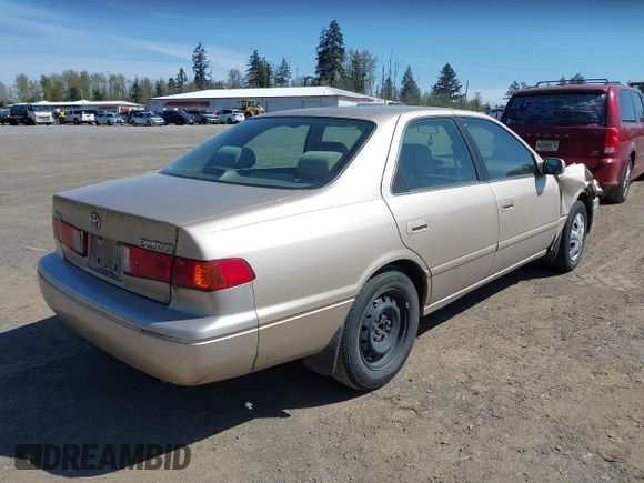 2001 Toyota Camry CE with VIN JT2BG22K910581703, listed as a IAAI auction lot 42020085 with 107,035 mi miles. Bid and sale history available at carsss.com. Image 4.