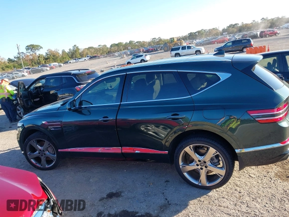 2021 Genesis GV80 with VIN KMUHCESC7MU072310, listed as a IAAI auction lot 41213884 with 18,480 mi miles and . Bid and sale history available at DreamBid. Image 14.