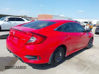 2021 Honda Civic Sport with VIN 2HGFC2F85MH509062, listed as a IAAI auction lot 41884858 with 35,337 mi miles and . Bid and sale history available at DreamBid. Image 4.