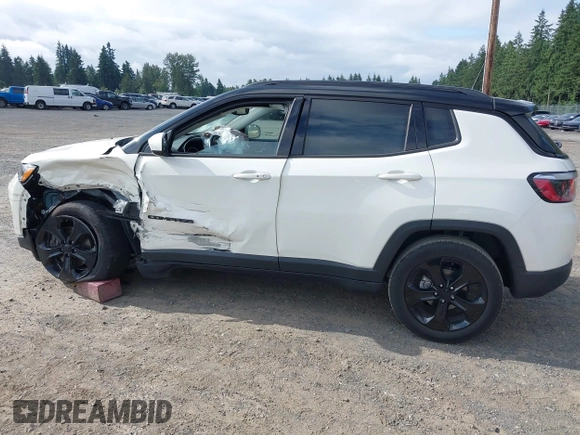 2019 Jeep Compass Latitude with VIN 3C4NJCBB0KT677025, listed as a IAAI auction lot 42574952 with 53,681 mi miles and . Bid and sale history available at DreamBid. Image 14.