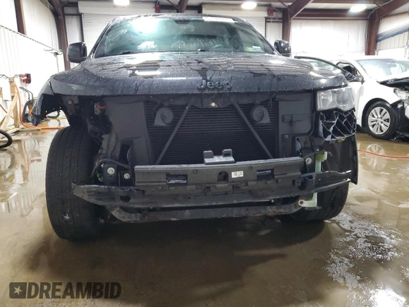 2018 Jeep Grand Cherokee Laredo E with VIN 1C4RJFAG9JC390597, listed as a Copart auction lot 61178955 with 78,363 mi miles and Salvage title. Bid and sale history available at DreamBid. Image 5.
