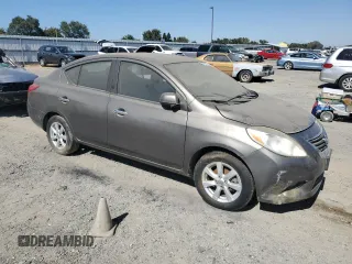 2012 Nissan Versa SV with VIN 3N1CN7AP1CL812288, listed as a Copart auction lot 63996355 with 128,229 mi miles and Clean title. Bid and sale history available at DreamBid. Image 4.