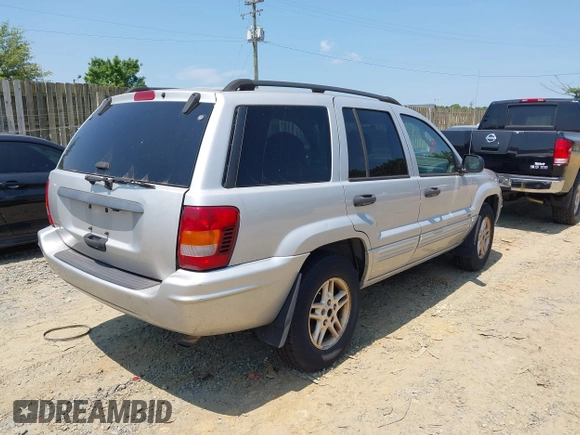 2004 Jeep Grand Cherokee Laredo with VIN 1J4GW48S94C369643, listed as a IAAI auction lot 42693998 with 225,033 mi miles and . Bid and sale history available at DreamBid. Image 4.
