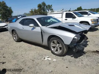 2021 Dodge Challenger SXT with VIN 2C3CDZAG6MH538662, listed as a Copart auction lot 69245164 with 76,227 mi miles and Salvage Title. Bid and sale history available at carsss.com. Image 4.