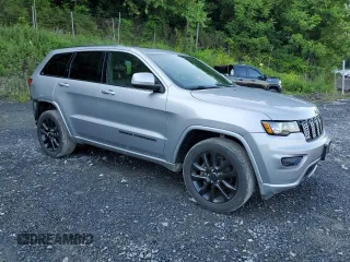 2020 Jeep Grand Cherokee Laredo E with VIN 1C4RJFAG1LC417794, listed as a Copart auction lot 59617005 with 62,430 mi miles and Salvage title. Bid and sale history available at DreamBid. Image 4.