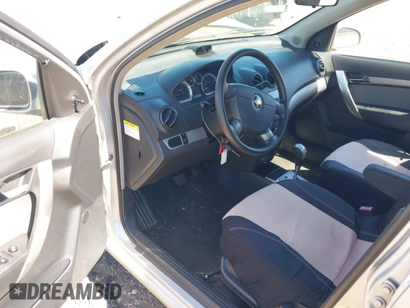 2009 Chevrolet Aveo 1LT with VIN KL1TD66E19B651119, listed as a IAAI auction lot 41648261 with 132,456 mi miles and . Bid and sale history available at DreamBid. Image 14.