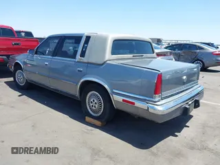 1991 Chrysler New Yorker z VIN 1C3XY66R2MD228813, wystawiony jako IAAI lot #42257734 z przebiegiem 45 786 mil mil oraz . Historia ofert i sprzedaży dostępna na DreamBid. Obrazek 3.