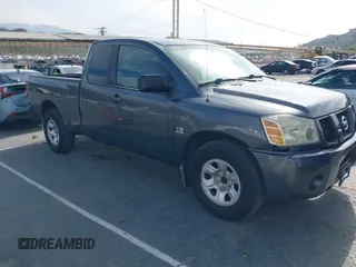 2004 Nissan Titan SE with VIN 1N6AA06A04N567056, listed as a IAAI auction lot 42044609 with 122,174 mi miles. Bid and sale history available at carsss.com. Image 1.